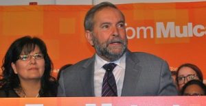 NDP Leader Thomas Mulcair (right) flanked by Federation of Saskatchewan Indian Nations Interim Leader Kimberley Jonathan (left) at a campaign stop in Saskatoon on Aug. 31.