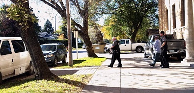 Larry McDougald is escorted from Prince Albert's Court of Queen's Bench. Photo by Chelsea Laskowski