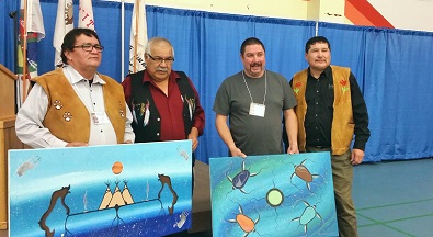 Chief Edward Henderson of Montreal Lake, Grand Chief Ron Michel, a Lac La Ronge representative and Vice Chief Brian Hardlotte. Photo by Chelsea Laskowski