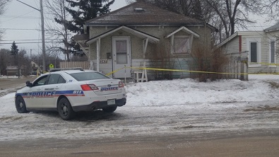 Caution tape up around Prince Albert home after 1st homicide of 2017