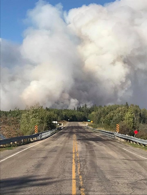 UPDATED – Wildfires in northeast Sask. force closure of highway