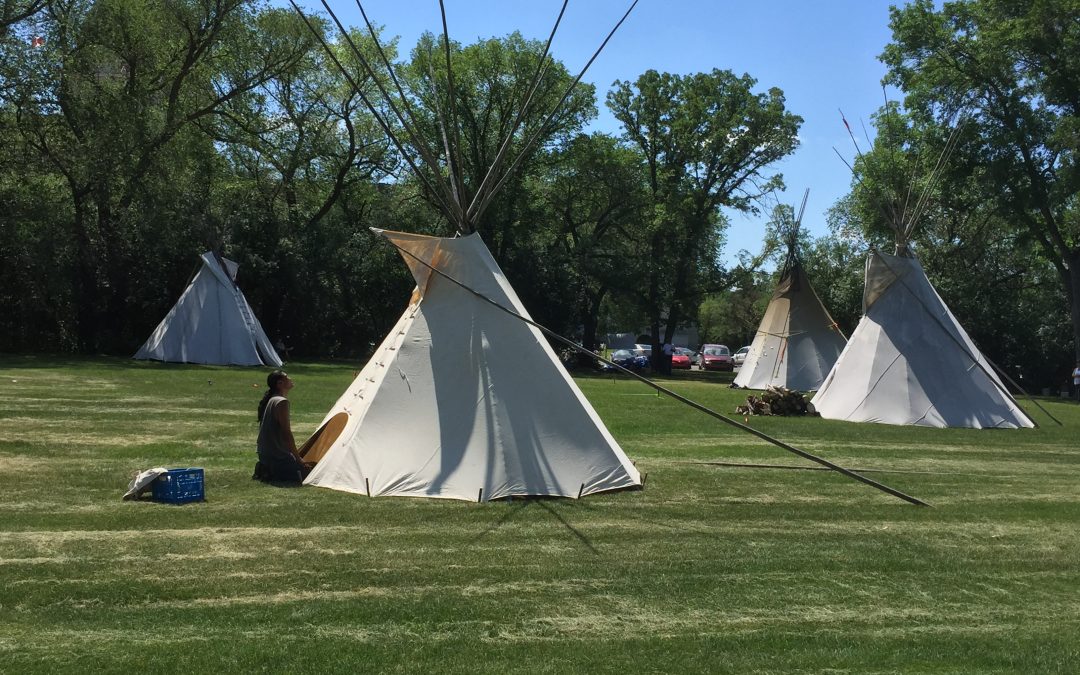 Protest camp back at Wascana Park with more teepees