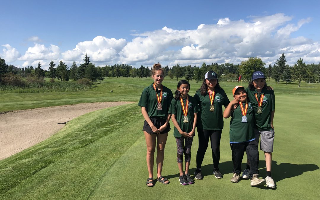 Team Woodland wins three golf medals