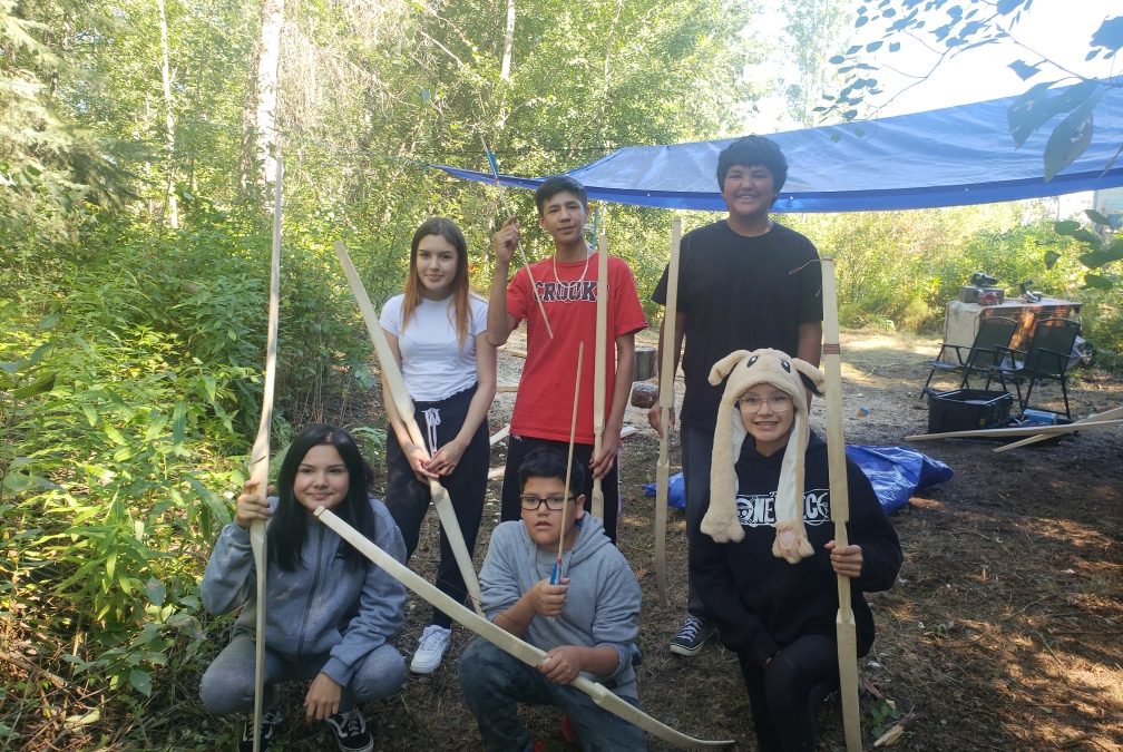 Peter Ballantyne Cree Nation students learn how to make bow and arrow at La Ronge camp