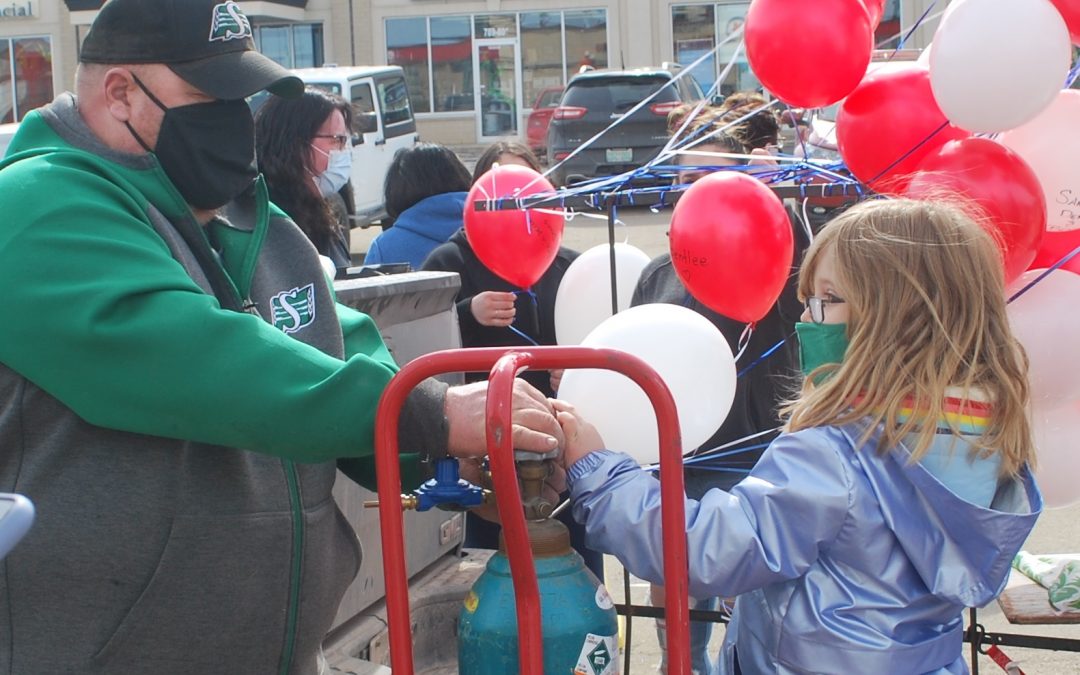 Prince Albert Co-op releases balloons in memory of family victimized by 2020 attack