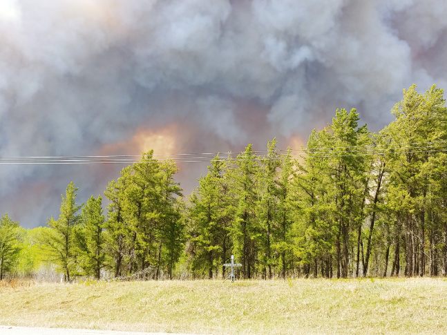 Firefighters hopeful cooler temperatures will help control Prince Albert area blaze