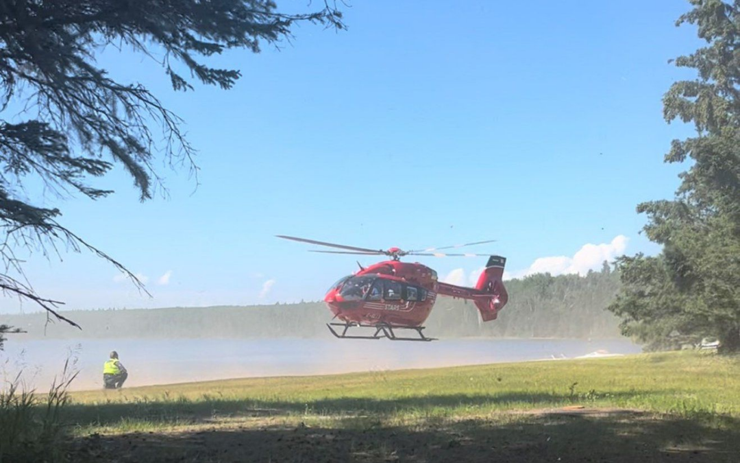 Families combine efforts to rescue drowning man at Sandy Lake