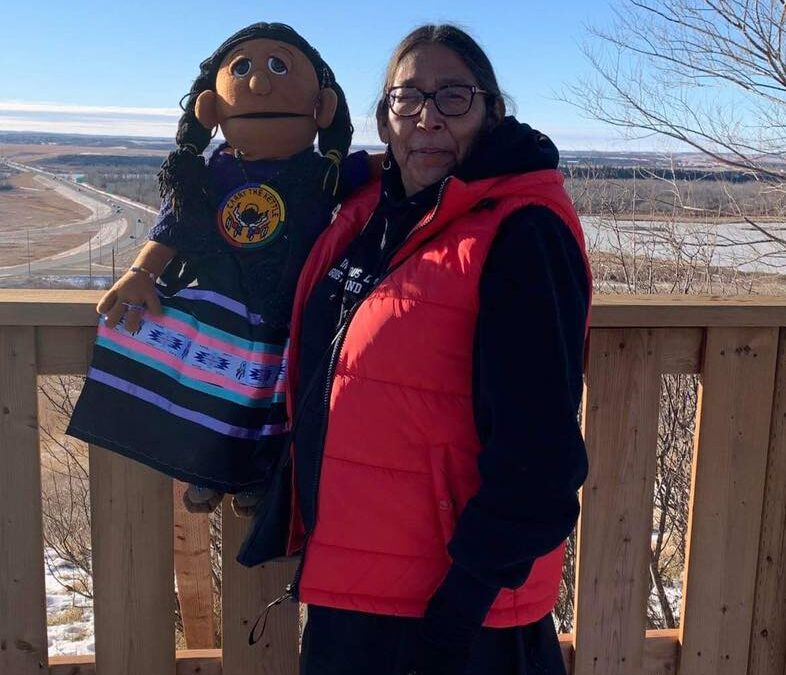 Nakoda teacher uses puppet to educate students in her language